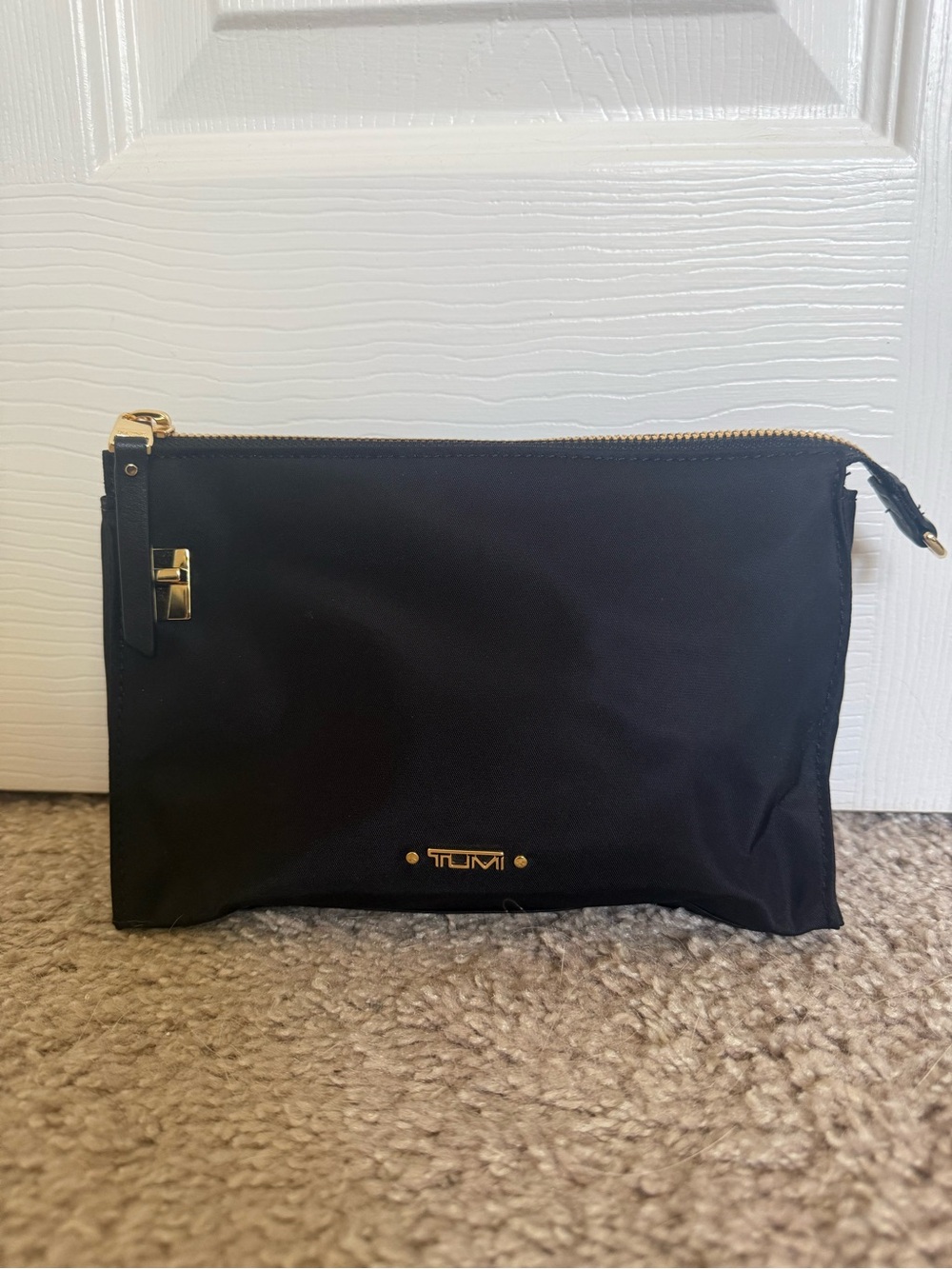 Tumi Black Toiletry Pouch with Gold Hardware